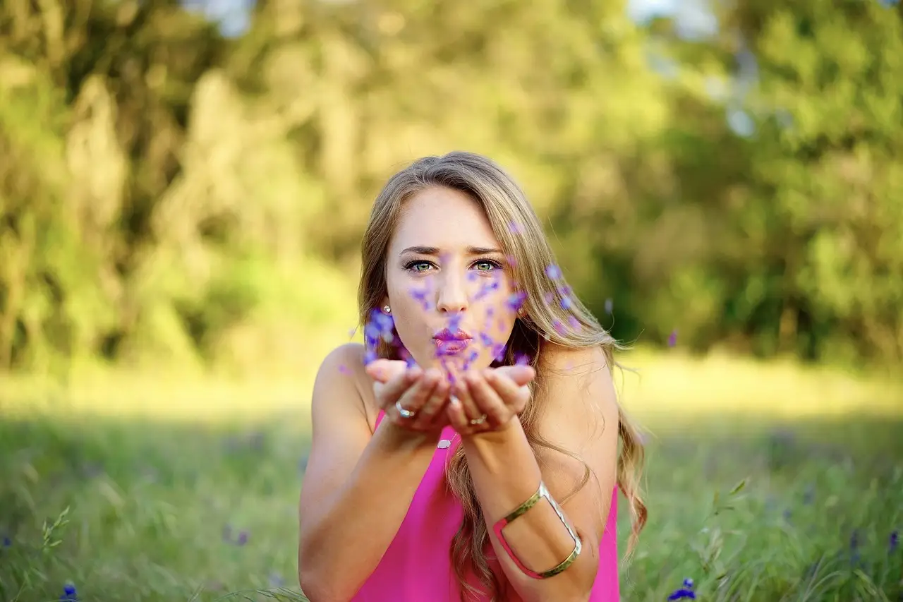 woman, petals, blowing-1854443.jpg